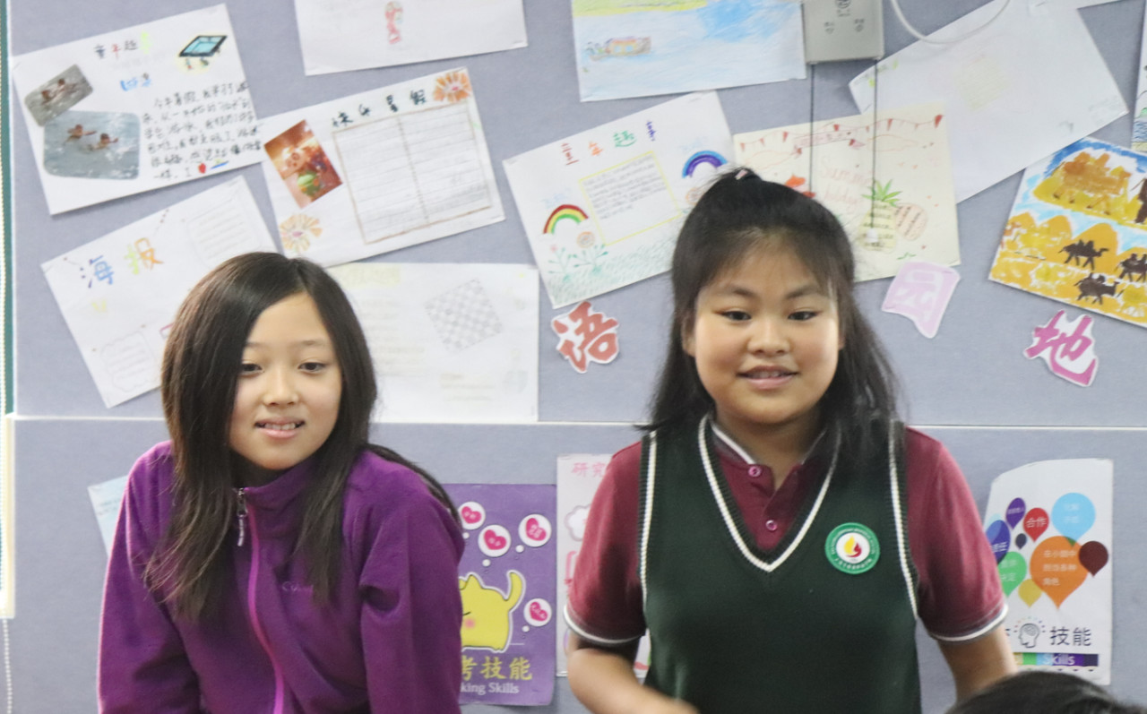 韩国矜拿来小学友好访问上海燎原双语学校
